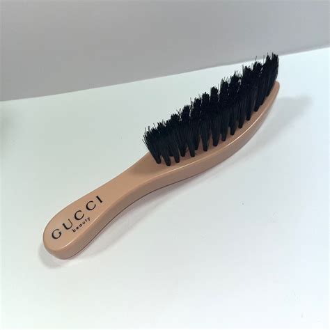 gucci brush hair